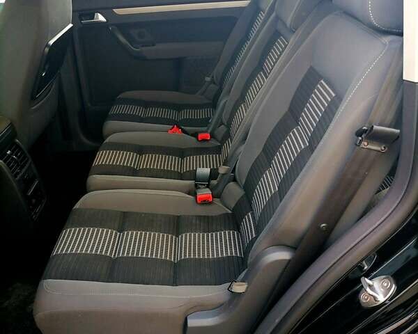 Черный Фольксваген Туран, объемом двигателя 1.4 л и пробегом 193 тыс. км за 6600 $, фото 6 на Automoto.ua