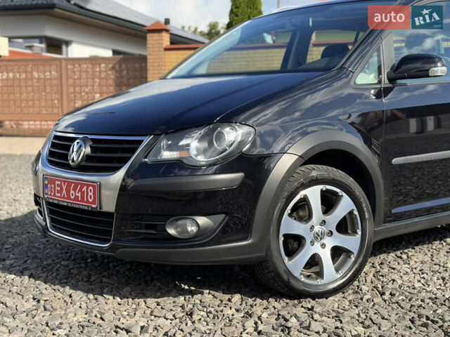 Чорний Фольксваген Туран, об'ємом двигуна 1.4 л та пробігом 220 тис. км за 8350 $, фото 2 на Automoto.ua