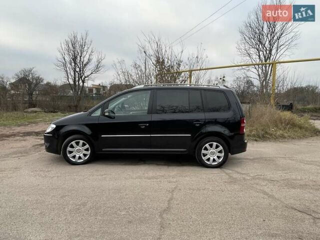 Черный Фольксваген Туран, объемом двигателя 1.4 л и пробегом 194 тыс. км за 6555 $, фото 12 на Automoto.ua