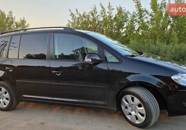 Черный Фольксваген Туран, объемом двигателя 1.4 л и пробегом 194 тыс. км за 7600 $, фото 7 на Automoto.ua