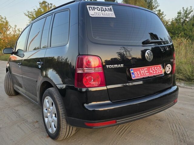 Черный Фольксваген Туран, объемом двигателя 1.4 л и пробегом 200 тыс. км за 6900 $, фото 4 на Automoto.ua