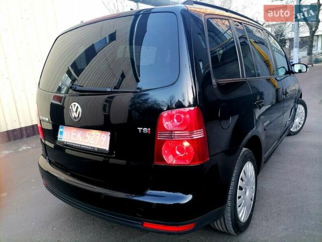 Черный Фольксваген Туран, объемом двигателя 1.4 л и пробегом 193 тыс. км за 6600 $, фото 16 на Automoto.ua