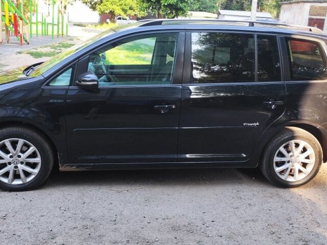 Черный Фольксваген Туран, объемом двигателя 1.9 л и пробегом 275 тыс. км за 8000 $, фото 2 на Automoto.ua