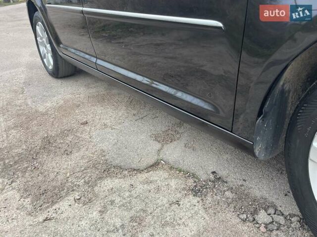 Черный Фольксваген Туран, объемом двигателя 1.4 л и пробегом 194 тыс. км за 6555 $, фото 5 на Automoto.ua