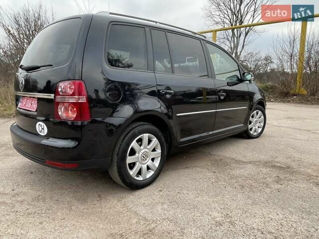 Черный Фольксваген Туран, объемом двигателя 1.4 л и пробегом 194 тыс. км за 6555 $, фото 96 на Automoto.ua