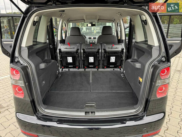 Черный Фольксваген Туран, объемом двигателя 1.4 л и пробегом 190 тыс. км за 7200 $, фото 47 на Automoto.ua