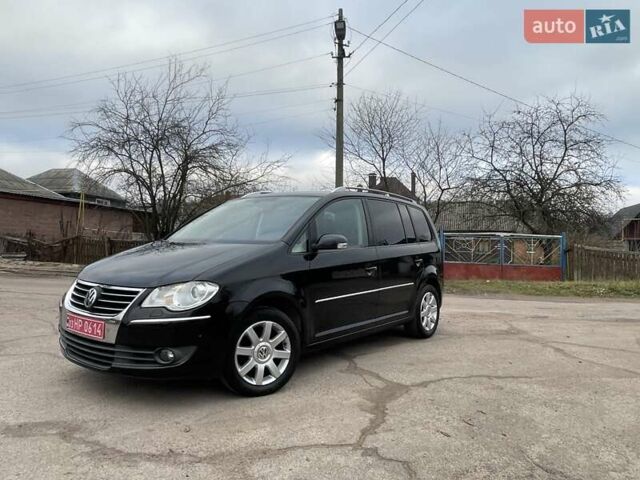Черный Фольксваген Туран, объемом двигателя 1.4 л и пробегом 194 тыс. км за 6555 $, фото 30 на Automoto.ua