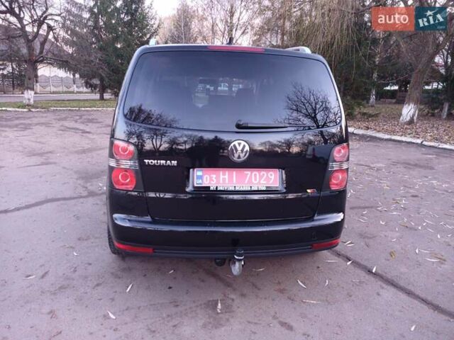 Черный Фольксваген Туран, объемом двигателя 1.6 л и пробегом 176 тыс. км за 8950 $, фото 9 на Automoto.ua