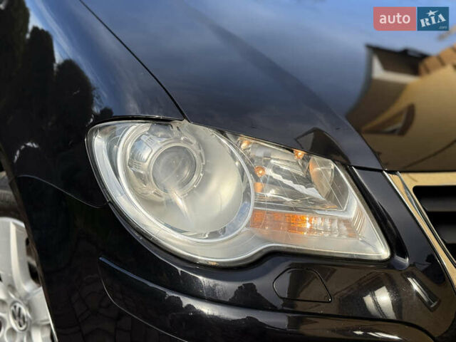 Чорний Фольксваген Туран, об'ємом двигуна 1.4 л та пробігом 148 тис. км за 5999 $, фото 70 на Automoto.ua