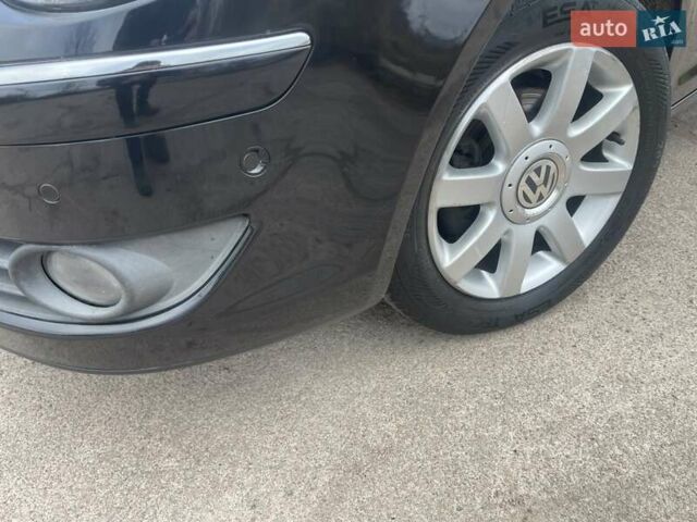 Черный Фольксваген Туран, объемом двигателя 1.4 л и пробегом 194 тыс. км за 6555 $, фото 19 на Automoto.ua