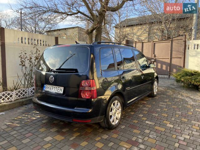 Чорний Фольксваген Туран, об'ємом двигуна 1.4 л та пробігом 270 тис. км за 6800 $, фото 8 на Automoto.ua