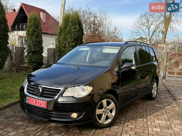 Чорний Фольксваген Туран, об'ємом двигуна 1.4 л та пробігом 148 тис. км за 5999 $, фото 1 на Automoto.ua