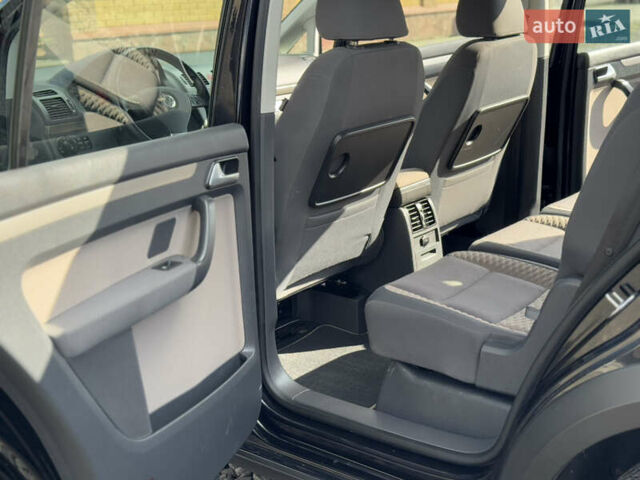 Чорний Фольксваген Туран, об'ємом двигуна 1.4 л та пробігом 220 тис. км за 8350 $, фото 26 на Automoto.ua