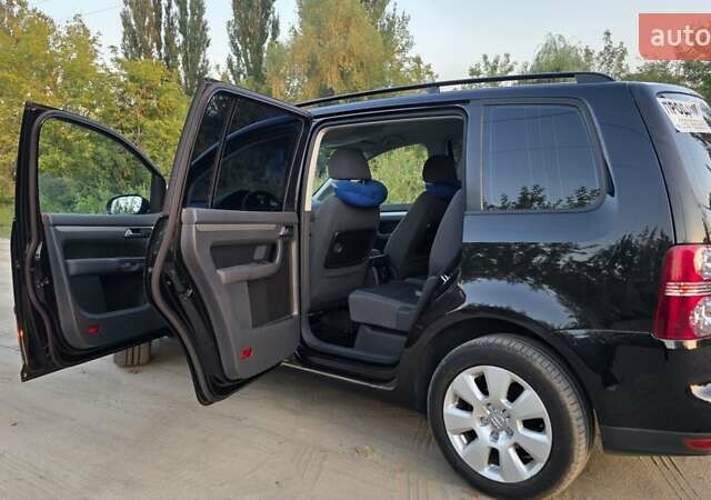 Черный Фольксваген Туран, объемом двигателя 1.4 л и пробегом 194 тыс. км за 7600 $, фото 12 на Automoto.ua