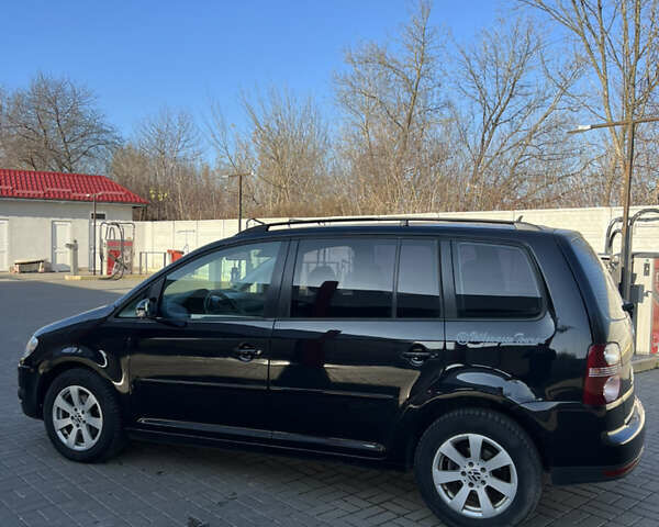 Черный Фольксваген Туран, объемом двигателя 1.9 л и пробегом 353 тыс. км за 6699 $, фото 6 на Automoto.ua