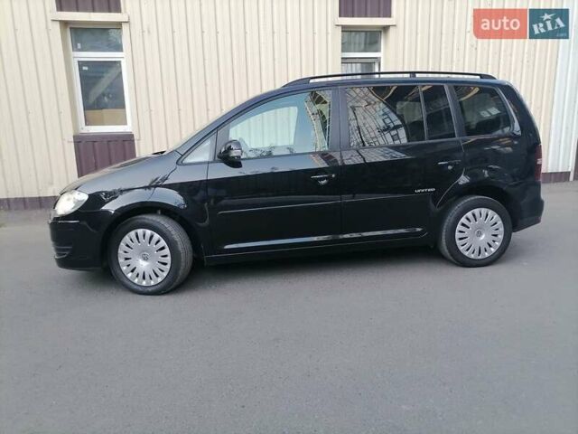 Черный Фольксваген Туран, объемом двигателя 1.4 л и пробегом 193 тыс. км за 6600 $, фото 3 на Automoto.ua