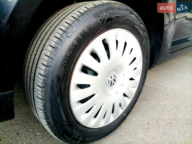 Черный Фольксваген Туран, объемом двигателя 1.4 л и пробегом 193 тыс. км за 6600 $, фото 13 на Automoto.ua