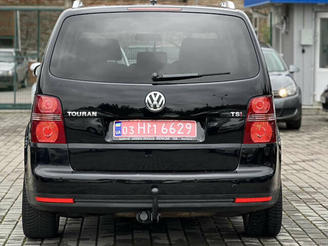 Черный Фольксваген Туран, объемом двигателя 1.4 л и пробегом 195 тыс. км за 7600 $, фото 5 на Automoto.ua