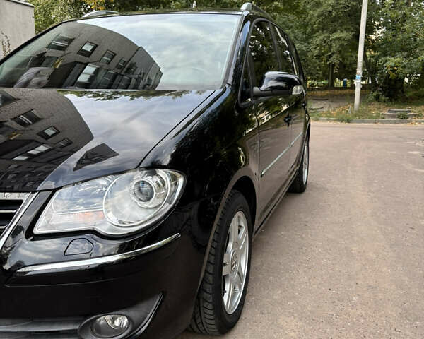 Черный Фольксваген Туран, объемом двигателя 1.39 л и пробегом 167 тыс. км за 7900 $, фото 35 на Automoto.ua