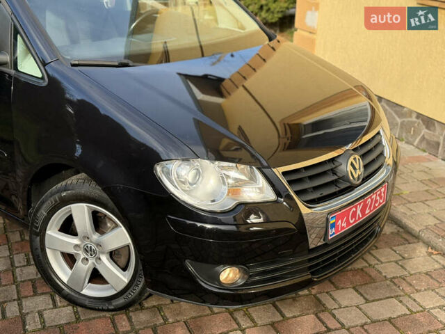 Чорний Фольксваген Туран, об'ємом двигуна 1.4 л та пробігом 148 тис. км за 5999 $, фото 65 на Automoto.ua