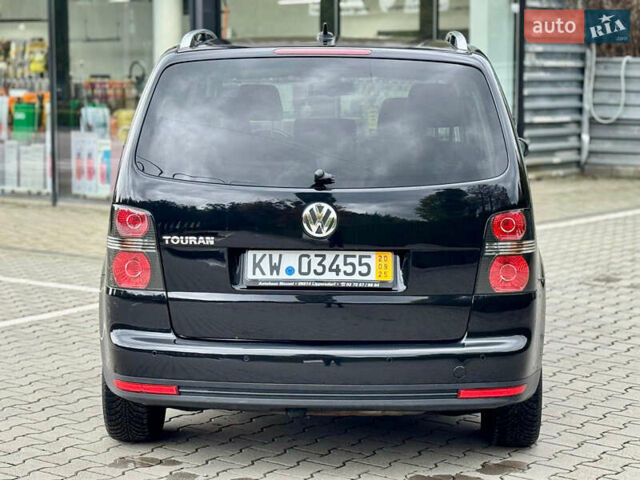 Черный Фольксваген Туран, объемом двигателя 1.4 л и пробегом 190 тыс. км за 7200 $, фото 7 на Automoto.ua