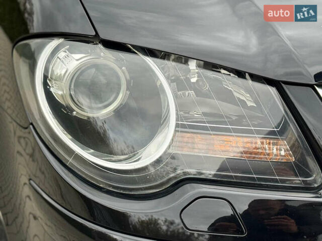 Черный Фольксваген Туран, объемом двигателя 1.4 л и пробегом 190 тыс. км за 7200 $, фото 11 на Automoto.ua