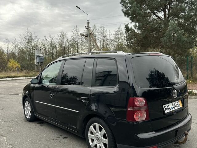 Чорний Фольксваген Туран, об'ємом двигуна 0 л та пробігом 321 тис. км за 3884 $, фото 2 на Automoto.ua