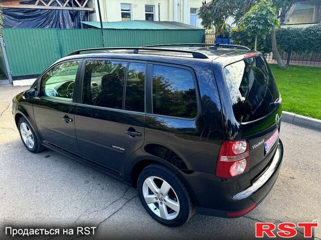 Черный Фольксваген Туран, объемом двигателя 1.6 л и пробегом 224 тыс. км за 8550 $, фото 3 на Automoto.ua