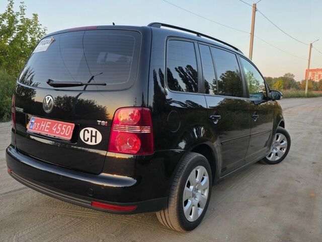 Черный Фольксваген Туран, объемом двигателя 1.4 л и пробегом 200 тыс. км за 6900 $, фото 5 на Automoto.ua