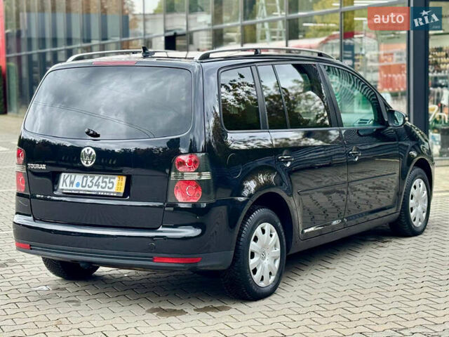 Черный Фольксваген Туран, объемом двигателя 1.4 л и пробегом 190 тыс. км за 7200 $, фото 8 на Automoto.ua