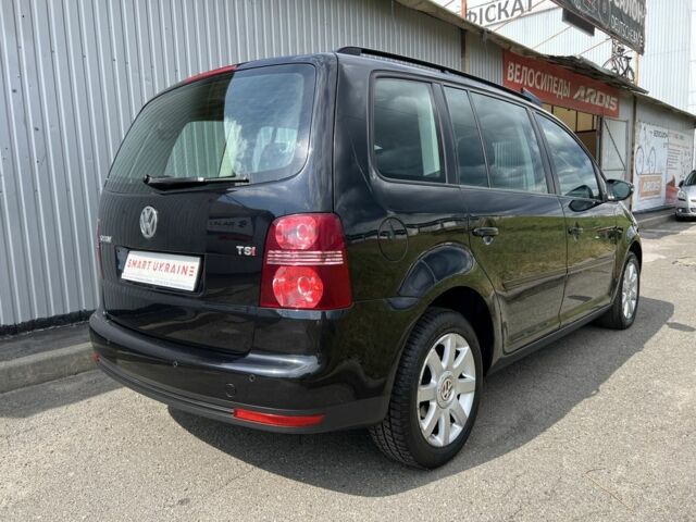 Черный Фольксваген Туран, объемом двигателя 1.4 л и пробегом 203 тыс. км за 6550 $, фото 2 на Automoto.ua