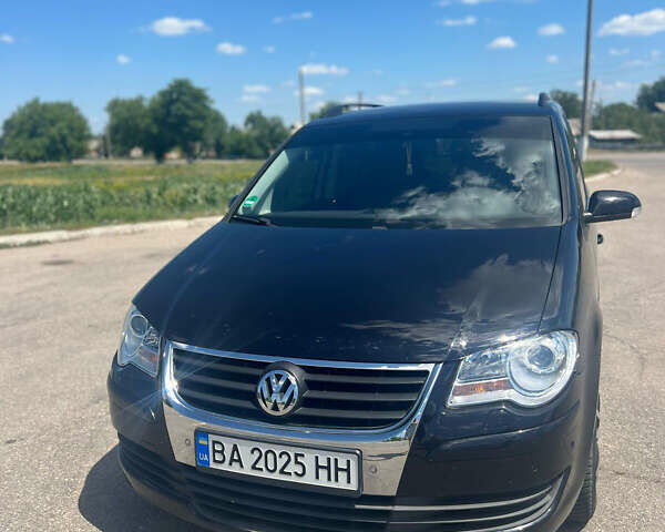 Чорний Фольксваген Туран, об'ємом двигуна 1.4 л та пробігом 186 тис. км за 8000 $, фото 9 на Automoto.ua