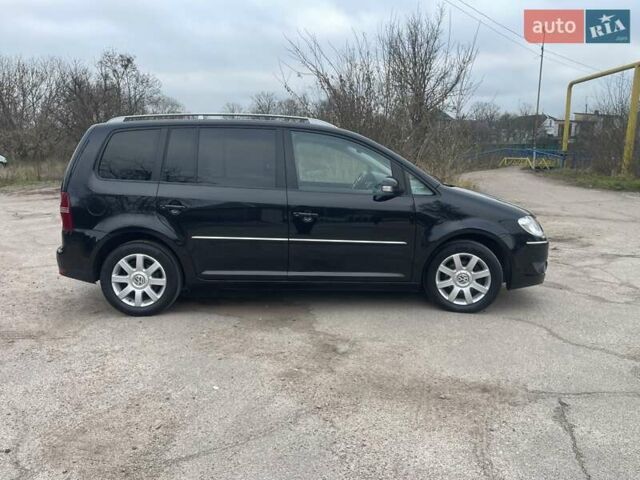 Черный Фольксваген Туран, объемом двигателя 1.4 л и пробегом 194 тыс. км за 6555 $, фото 87 на Automoto.ua