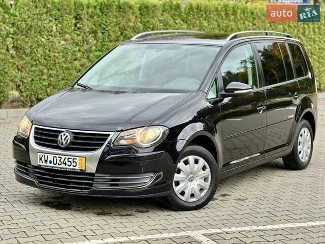 Чорний Фольксваген Туран, об'ємом двигуна 1.4 л та пробігом 190 тис. км за 6950 $, фото 1 на Automoto.ua