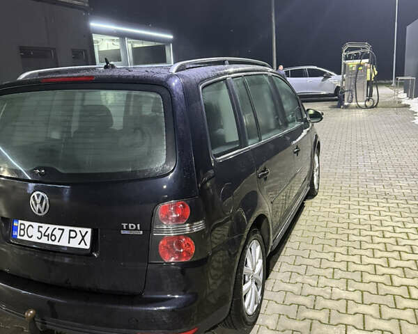 Черный Фольксваген Туран, объемом двигателя 1.9 л и пробегом 246 тыс. км за 5900 $, фото 1 на Automoto.ua