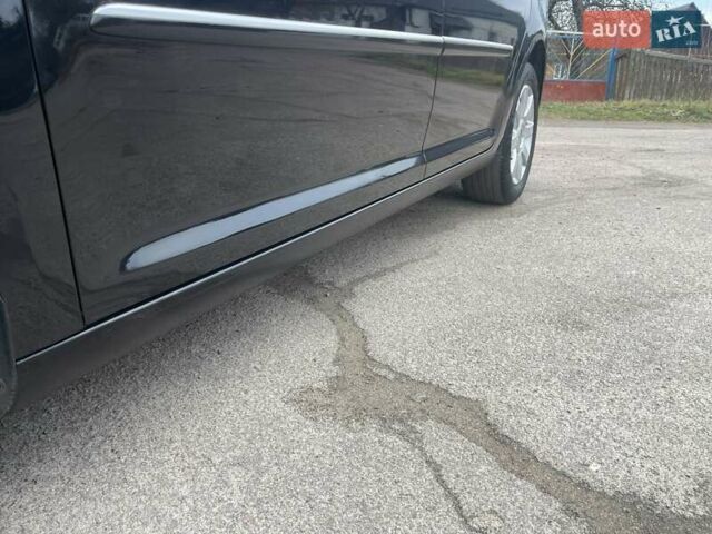 Черный Фольксваген Туран, объемом двигателя 1.4 л и пробегом 194 тыс. км за 6555 $, фото 22 на Automoto.ua