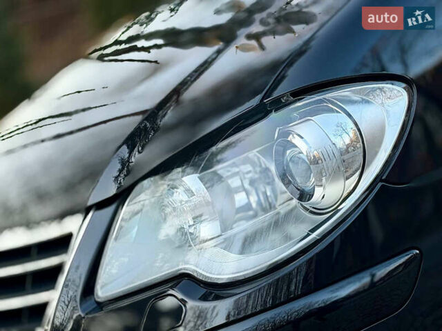 Чорний Фольксваген Туран, об'ємом двигуна 2 л та пробігом 292 тис. км за 8850 $, фото 10 на Automoto.ua