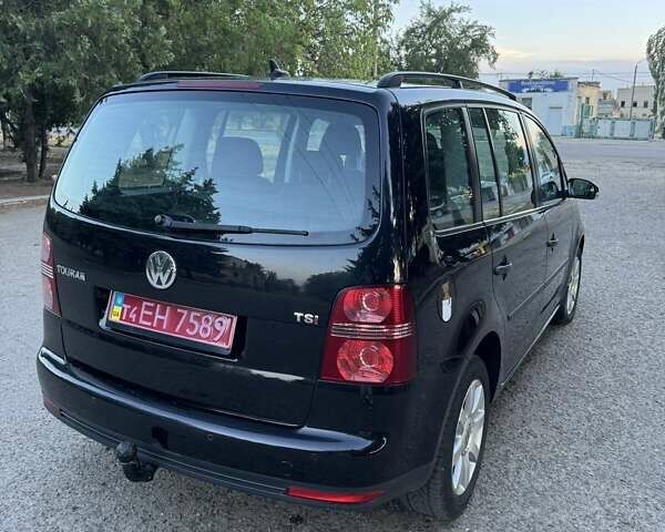 Чорний Фольксваген Туран, об'ємом двигуна 1.4 л та пробігом 172 тис. км за 6950 $, фото 3 на Automoto.ua