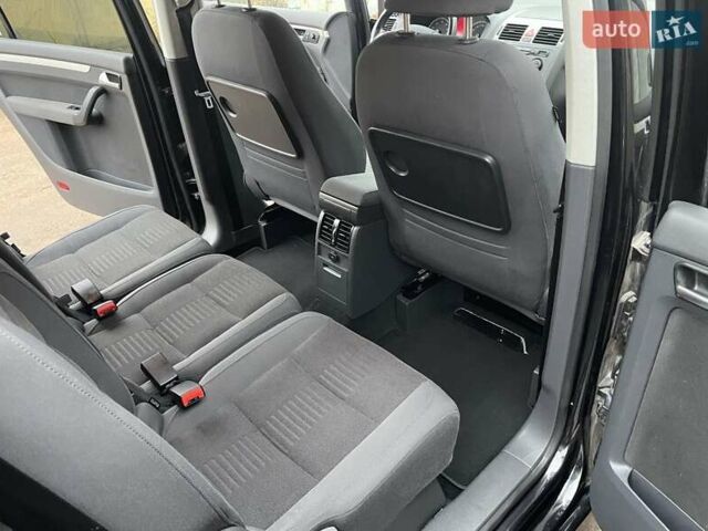 Черный Фольксваген Туран, объемом двигателя 1.4 л и пробегом 194 тыс. км за 6555 $, фото 143 на Automoto.ua