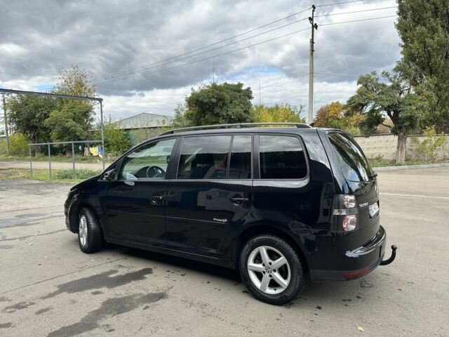 Черный Фольксваген Туран, объемом двигателя 1.4 л и пробегом 237 тыс. км за 6850 $, фото 2 на Automoto.ua