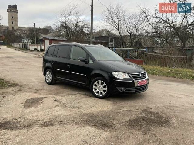 Черный Фольксваген Туран, объемом двигателя 1.4 л и пробегом 194 тыс. км за 6555 $, фото 4 на Automoto.ua