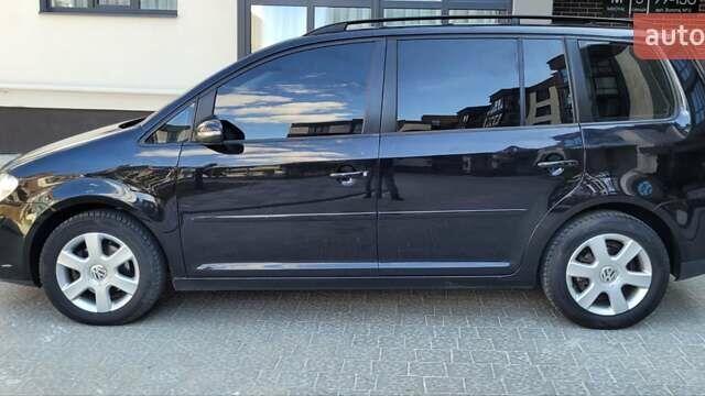 Черный Фольксваген Туран, объемом двигателя 1.97 л и пробегом 248 тыс. км за 8300 $, фото 7 на Automoto.ua