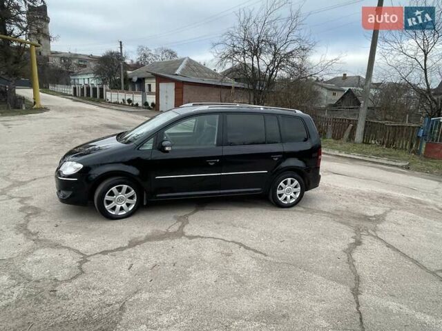 Черный Фольксваген Туран, объемом двигателя 1.4 л и пробегом 194 тыс. км за 6555 $, фото 32 на Automoto.ua