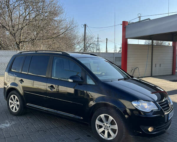 Черный Фольксваген Туран, объемом двигателя 1.9 л и пробегом 353 тыс. км за 6699 $, фото 14 на Automoto.ua