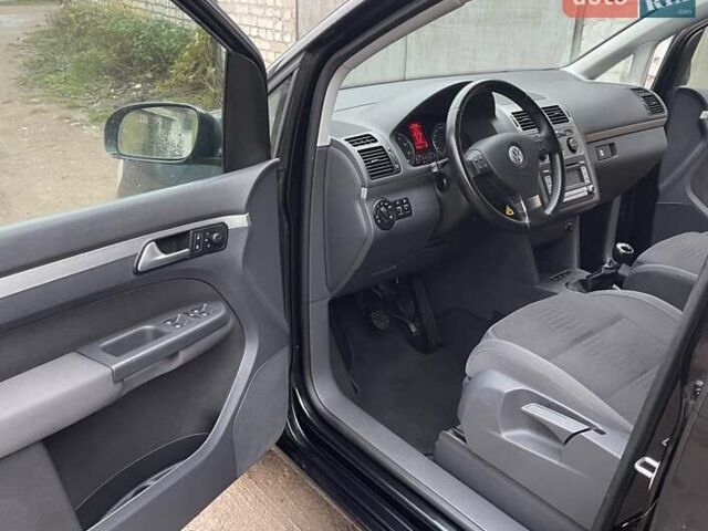 Черный Фольксваген Туран, объемом двигателя 1.4 л и пробегом 194 тыс. км за 6555 $, фото 37 на Automoto.ua