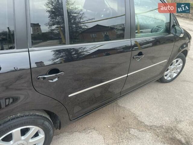 Черный Фольксваген Туран, объемом двигателя 1.4 л и пробегом 194 тыс. км за 6555 $, фото 92 на Automoto.ua