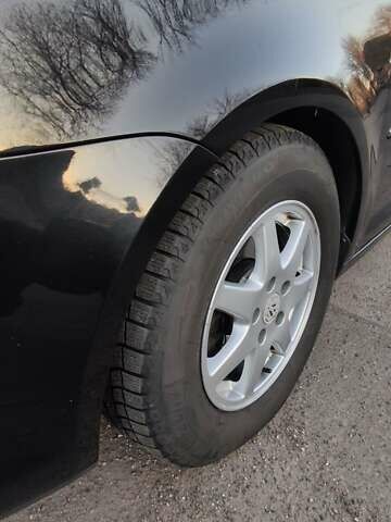 Черный Фольксваген Туран, объемом двигателя 1.4 л и пробегом 145 тыс. км за 8500 $, фото 6 на Automoto.ua