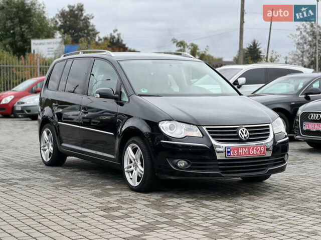 Черный Фольксваген Туран, объемом двигателя 1.4 л и пробегом 195 тыс. км за 7600 $, фото 3 на Automoto.ua