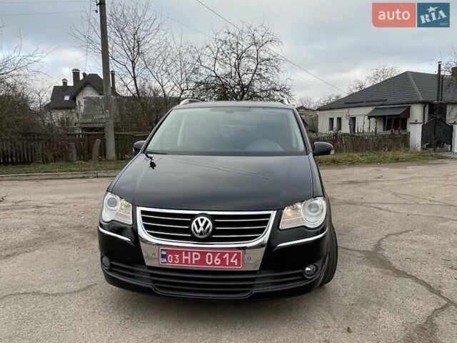 Черный Фольксваген Туран, объемом двигателя 1.4 л и пробегом 194 тыс. км за 6555 $, фото 77 на Automoto.ua