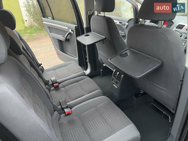 Черный Фольксваген Туран, объемом двигателя 1.4 л и пробегом 194 тыс. км за 6555 $, фото 141 на Automoto.ua